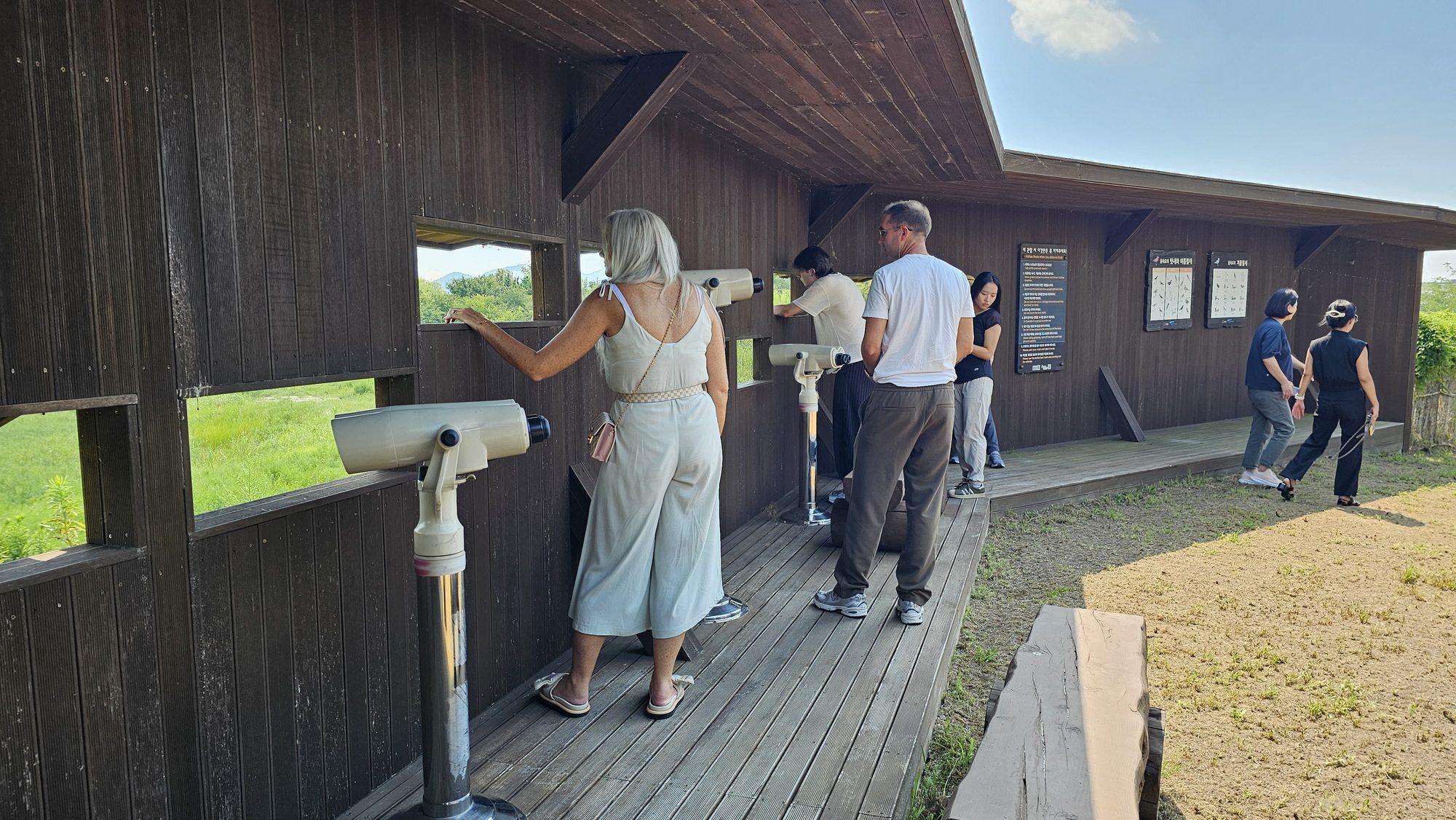 Guests at the birdwatching hide, taking a last quiet moment