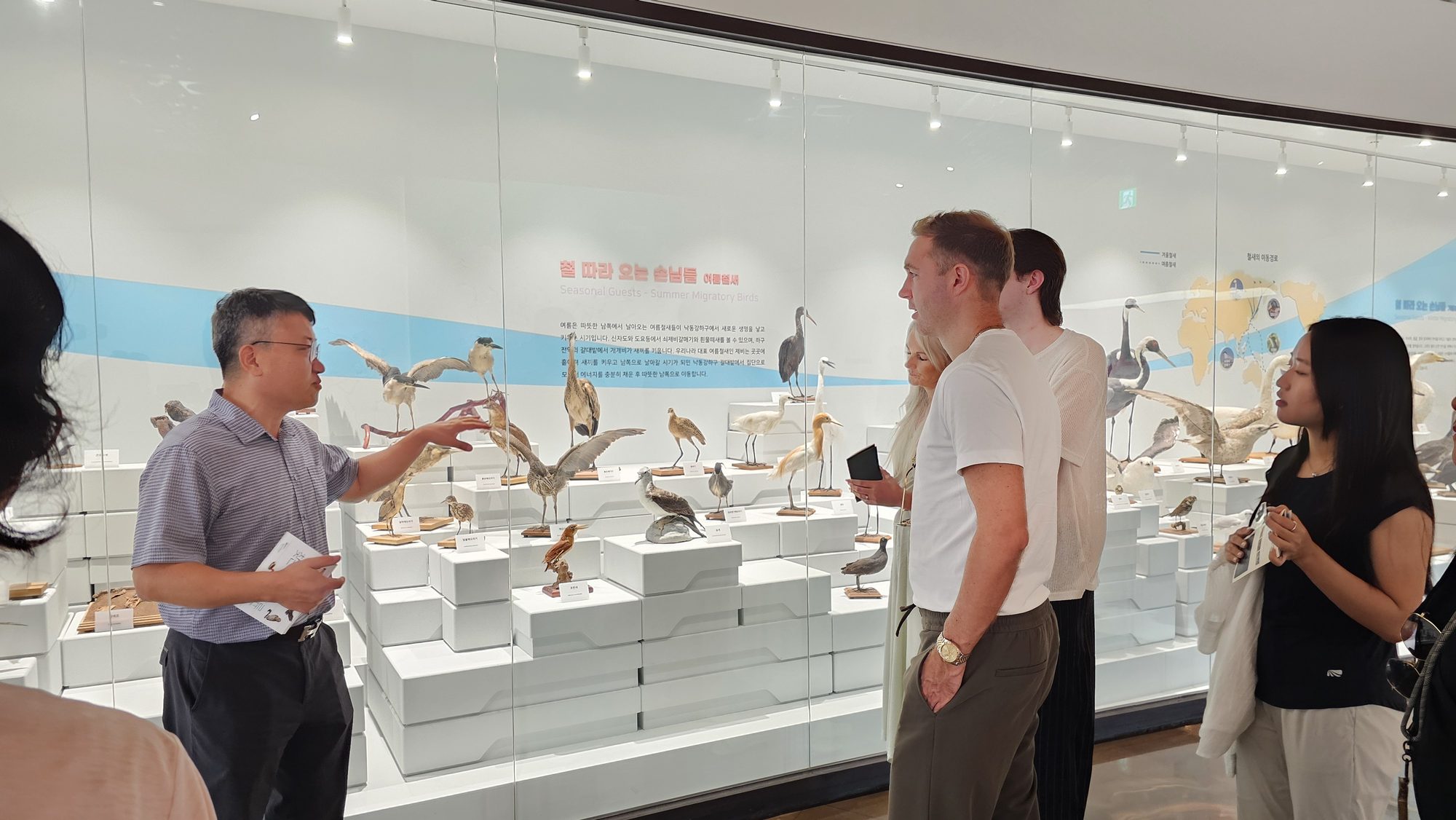 An Eco Center guide introducing the wetland's bird life to the group