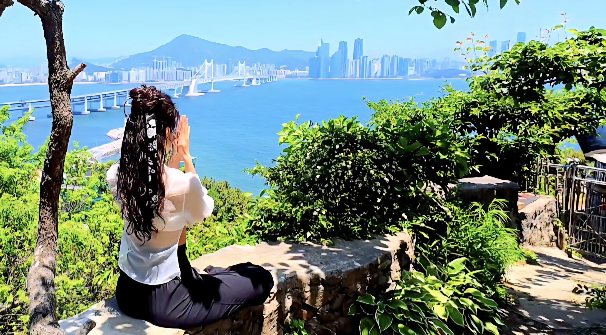 A guest pausing quietly overlooking the bay