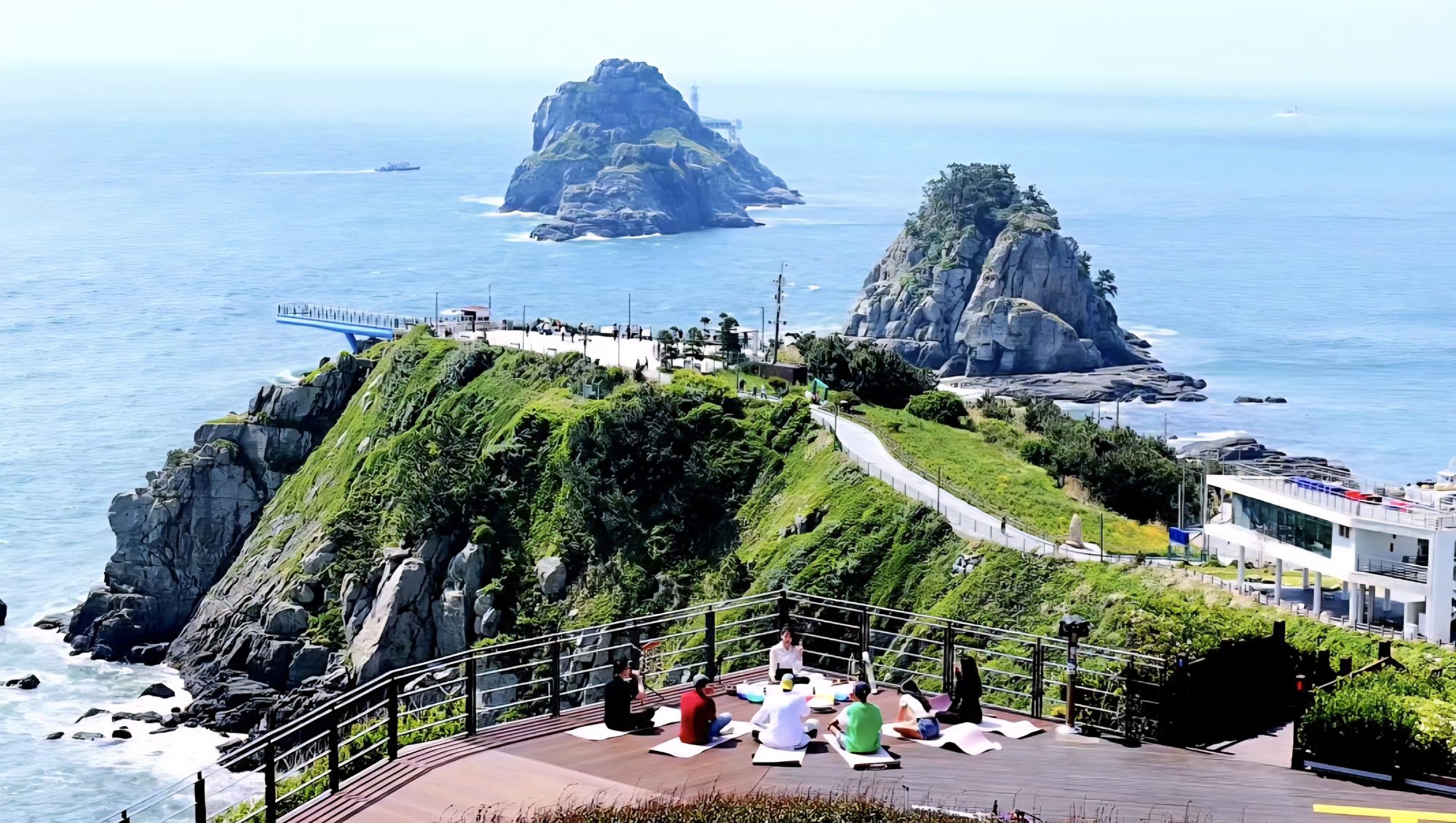 An ONDO host and guests at the Oryukdo viewpoint