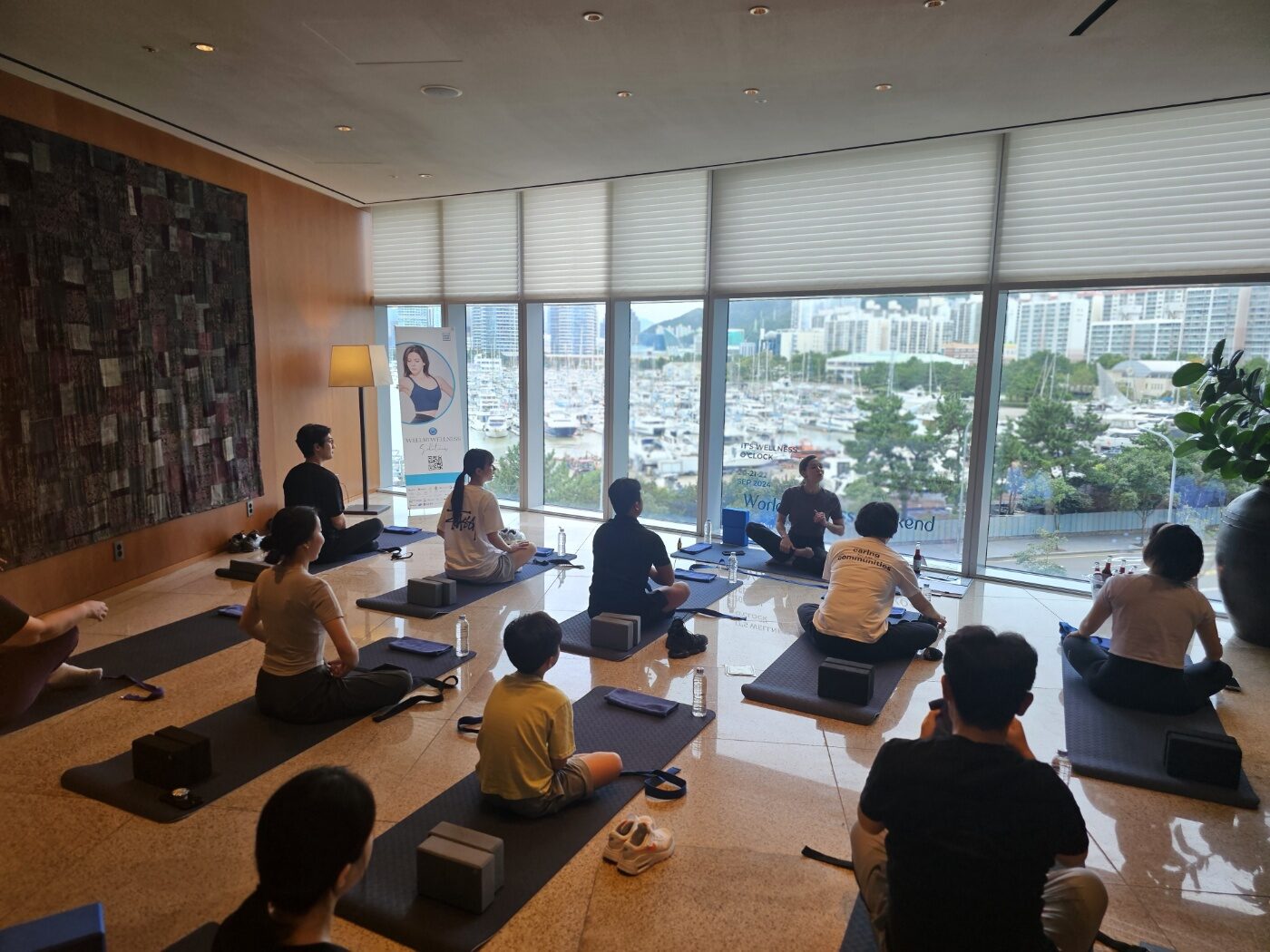 A WellMi wellness workshop overlooking the Busan marina