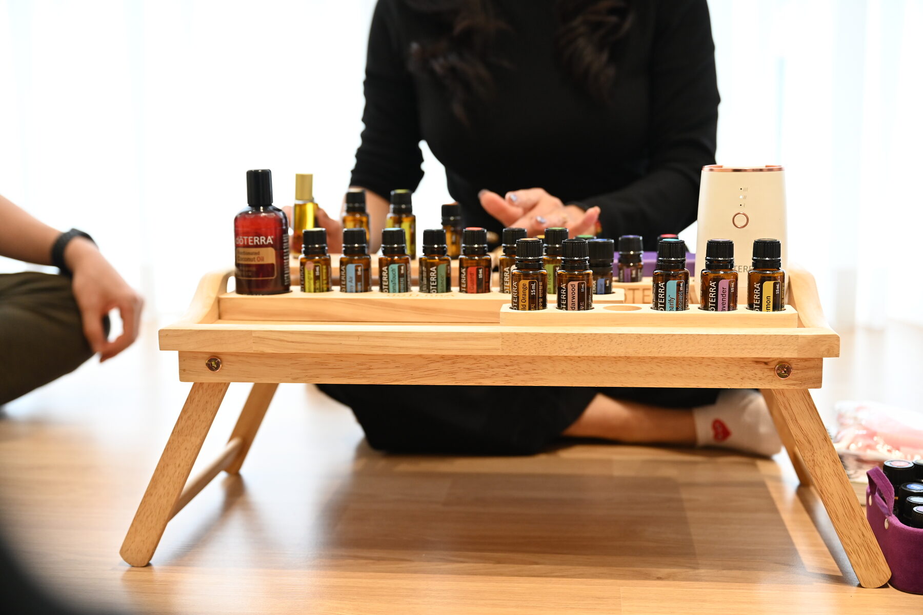 A tray of essential oils used in a WellMi wellness workshop